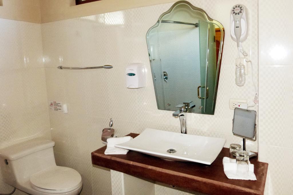Hotel Palace Galapagos Пуерто-Айора Номер фото